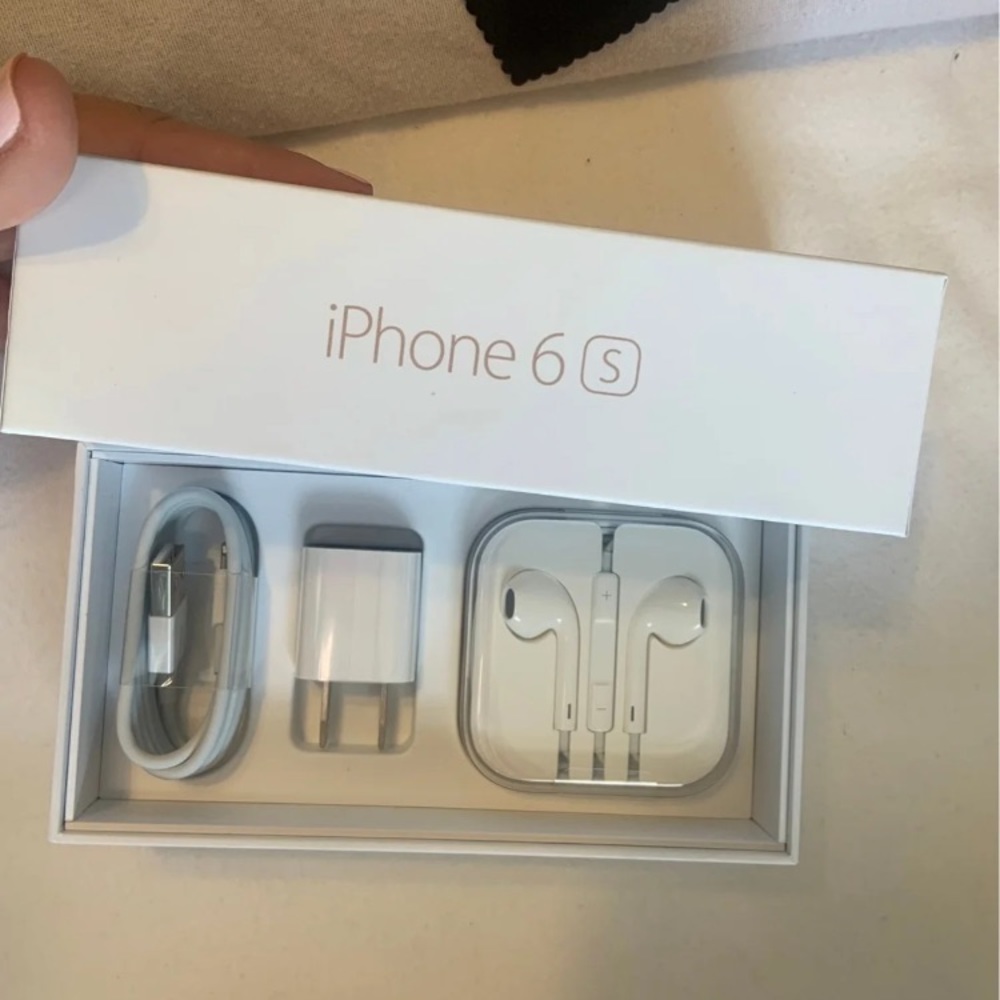 iPhone charger and headphones.